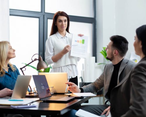 medium-shot-people-working-together-office (1)